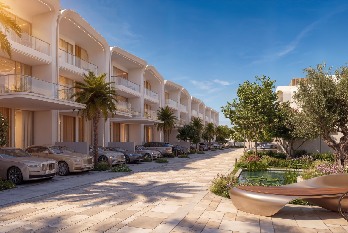 Greenz by Danube villas along a landscaped street at sunset