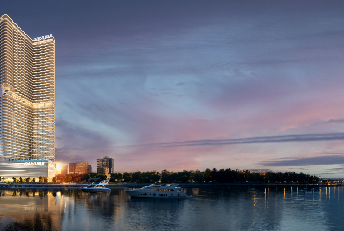 Night exterior view of Breez by Danube in Dubai Maritime City