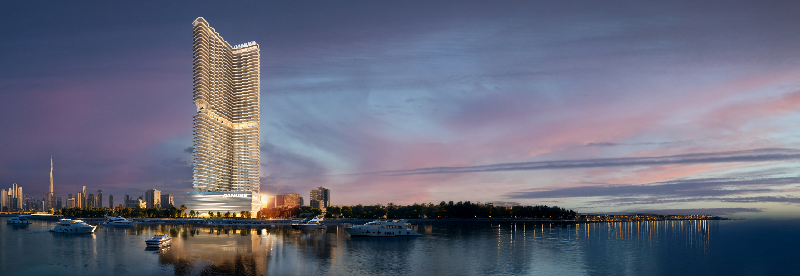 Night exterior view of Breez by Danube in Dubai Maritime City