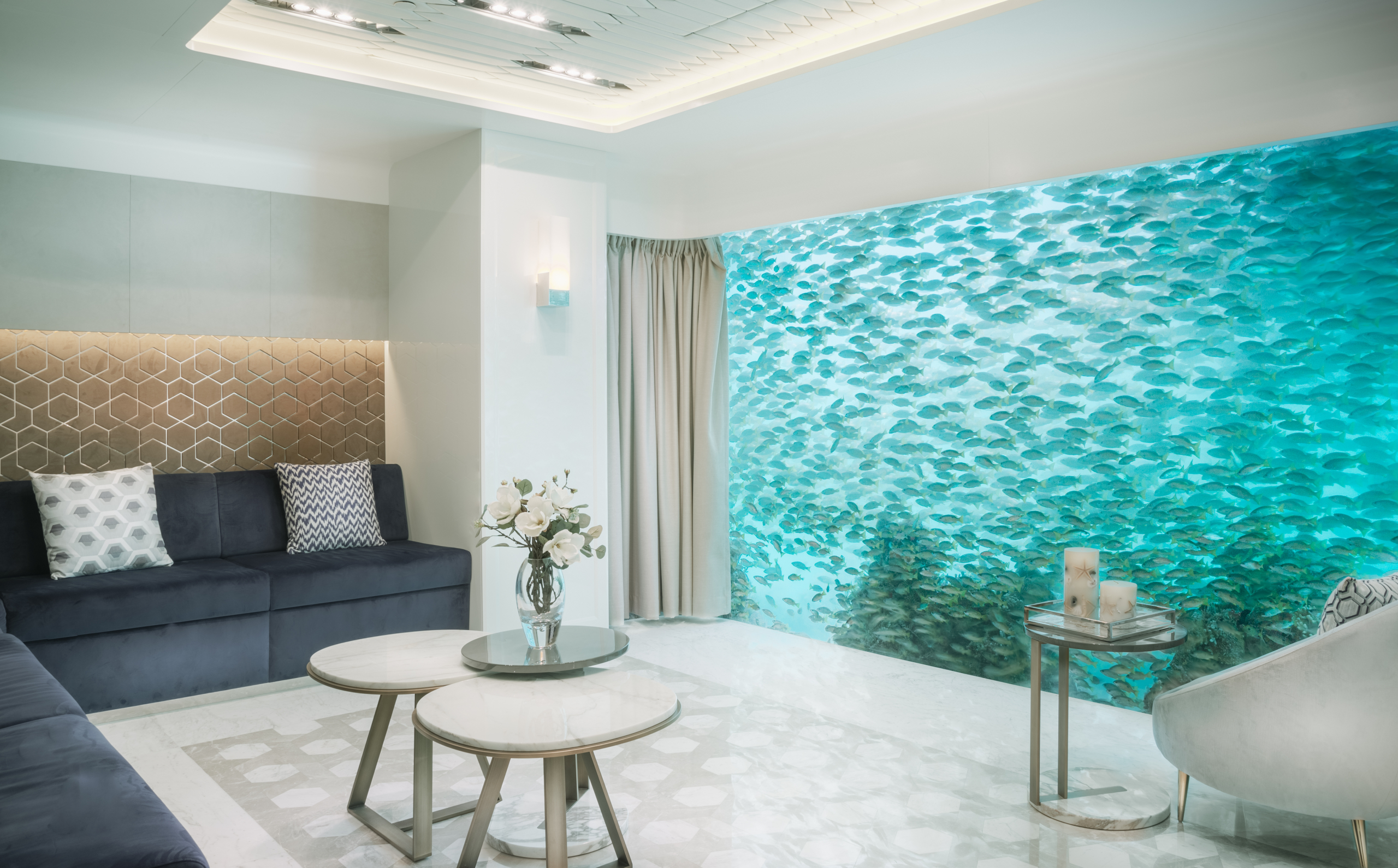 Floating Seahorse living room with aquarium at The Heart of Europe