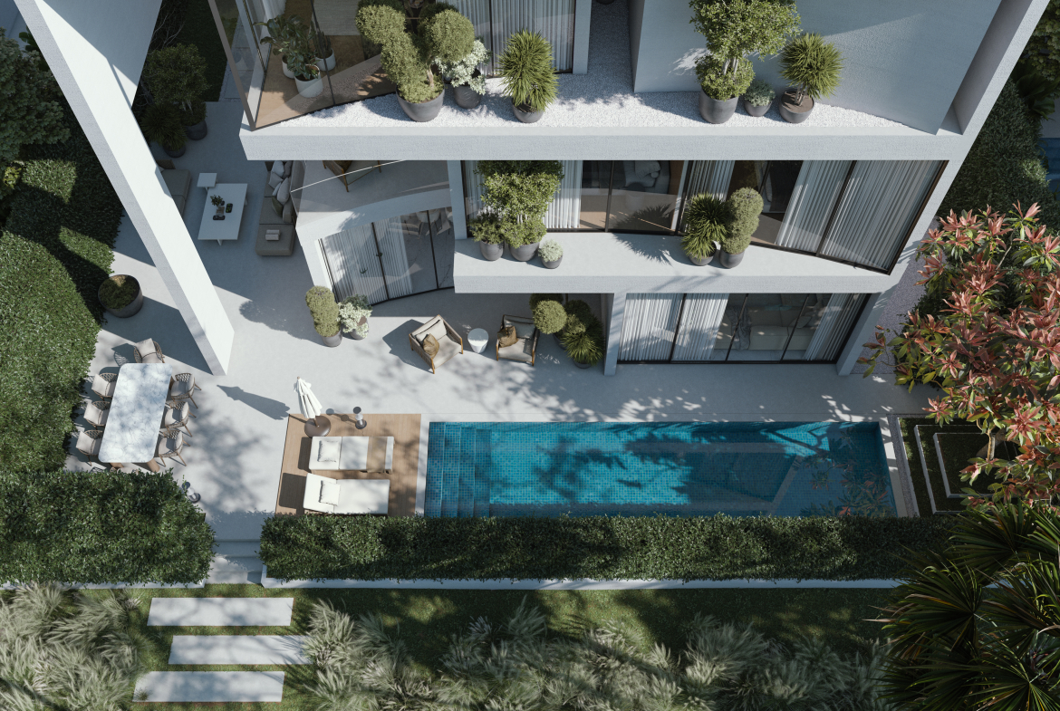 Aerial view of a Lunaya residence with private pool and garden