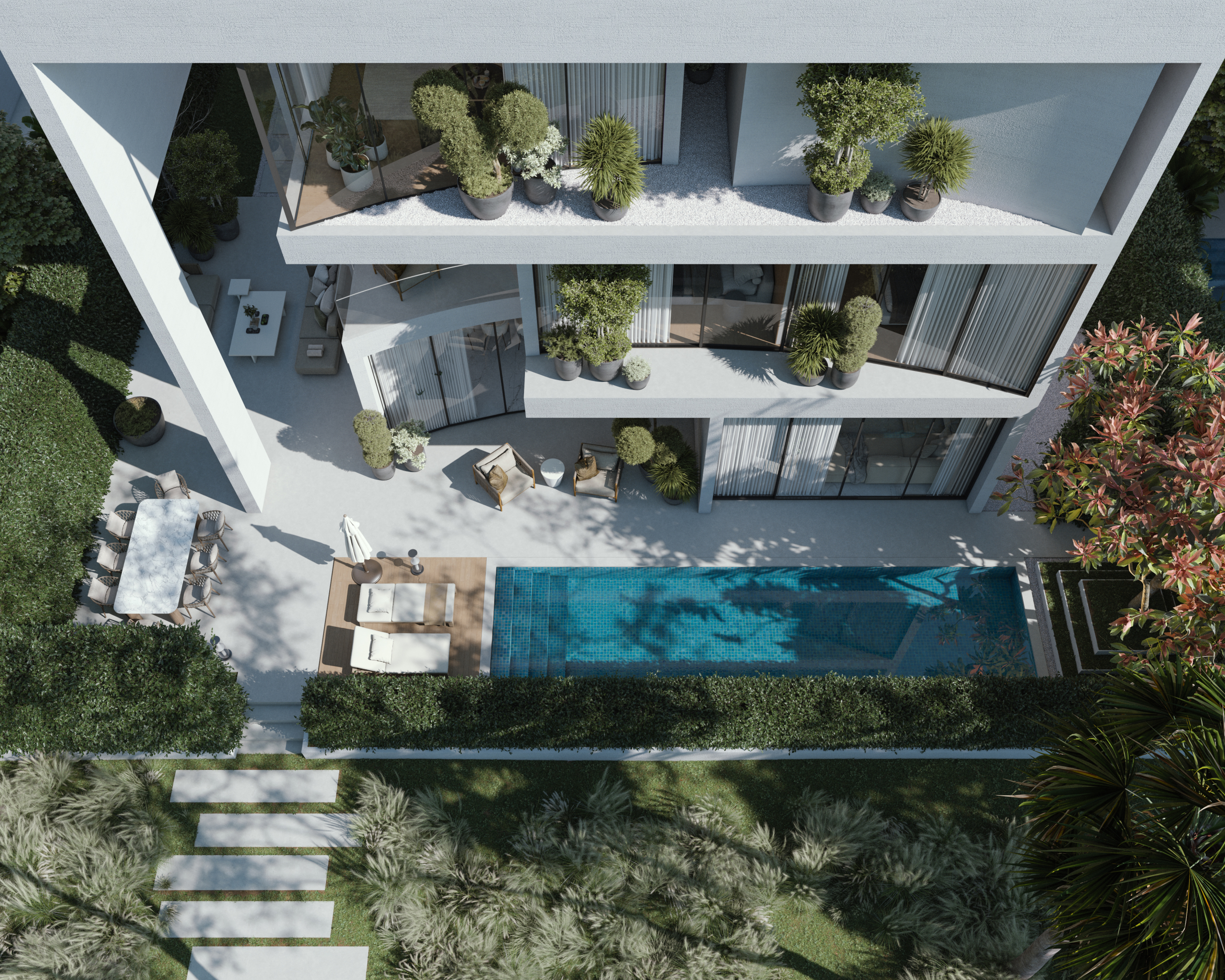 Aerial view of a Lunaya residence with private pool and garden