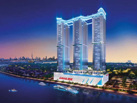 Illuminated Oceanz 3 towers on the Dubai Maritime City waterfront