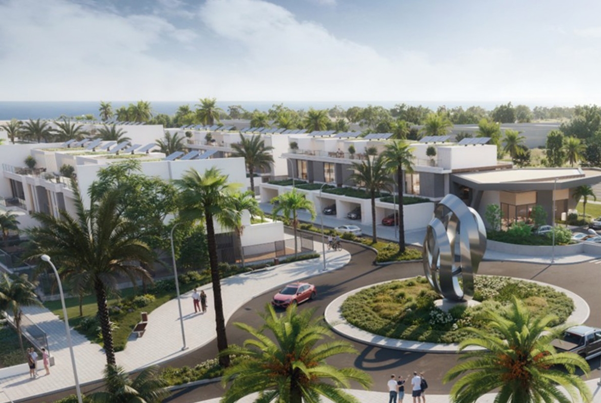 Landscaped townhouse exterior at Aila Homes