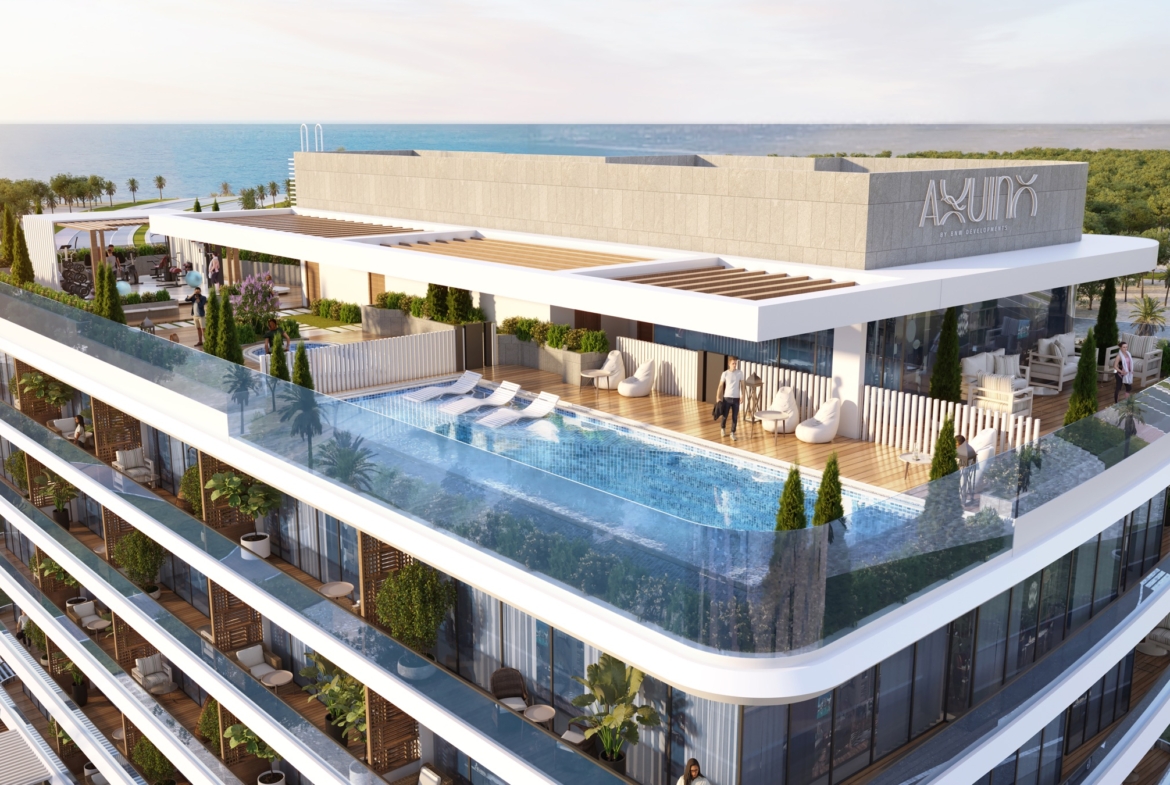 Aerial view of Aquino rooftop pool and architecture on Al Marjan Island