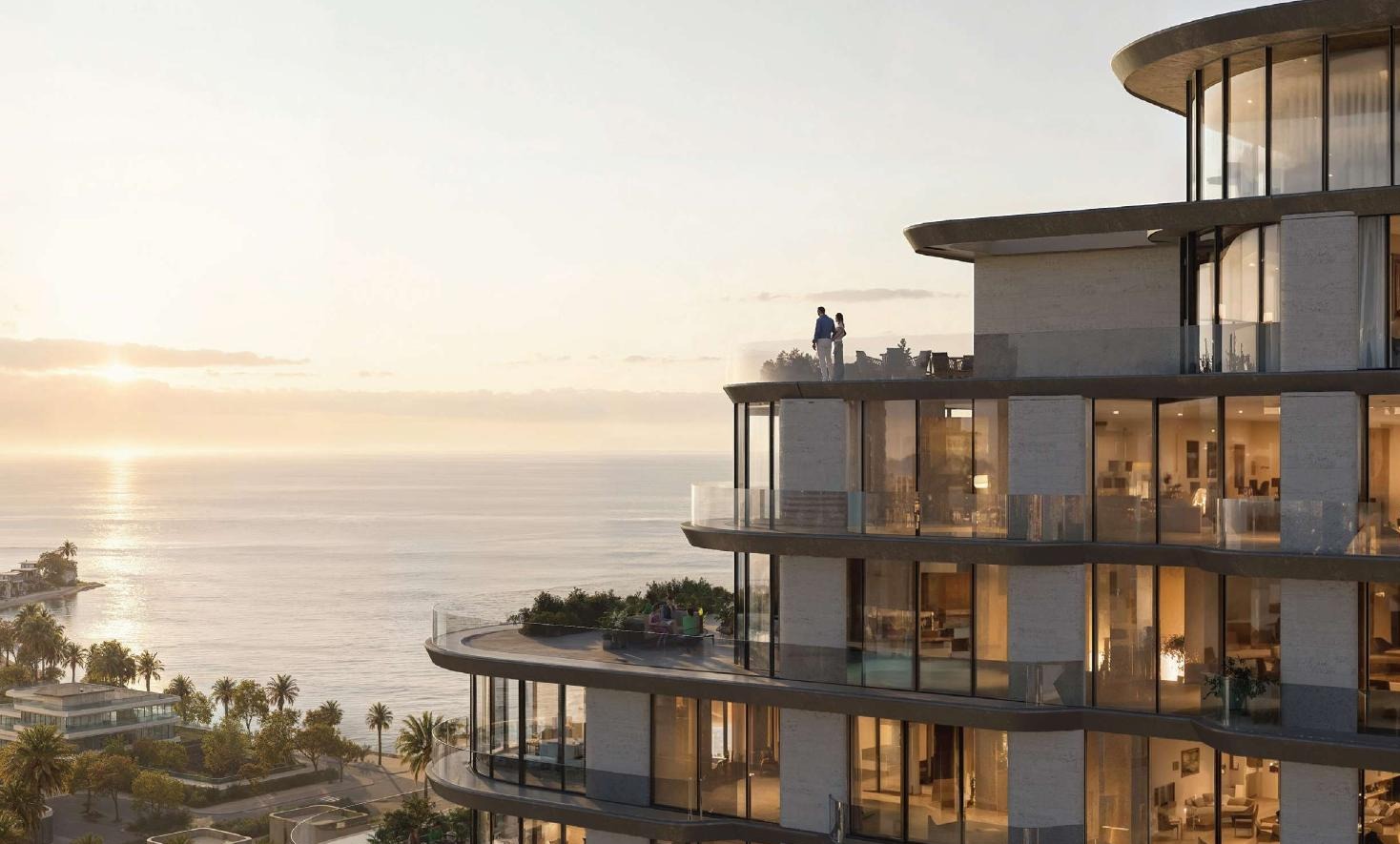 Mirasol II sunset exterior Mirasol II cascading waterfront residence exterior at sunset
