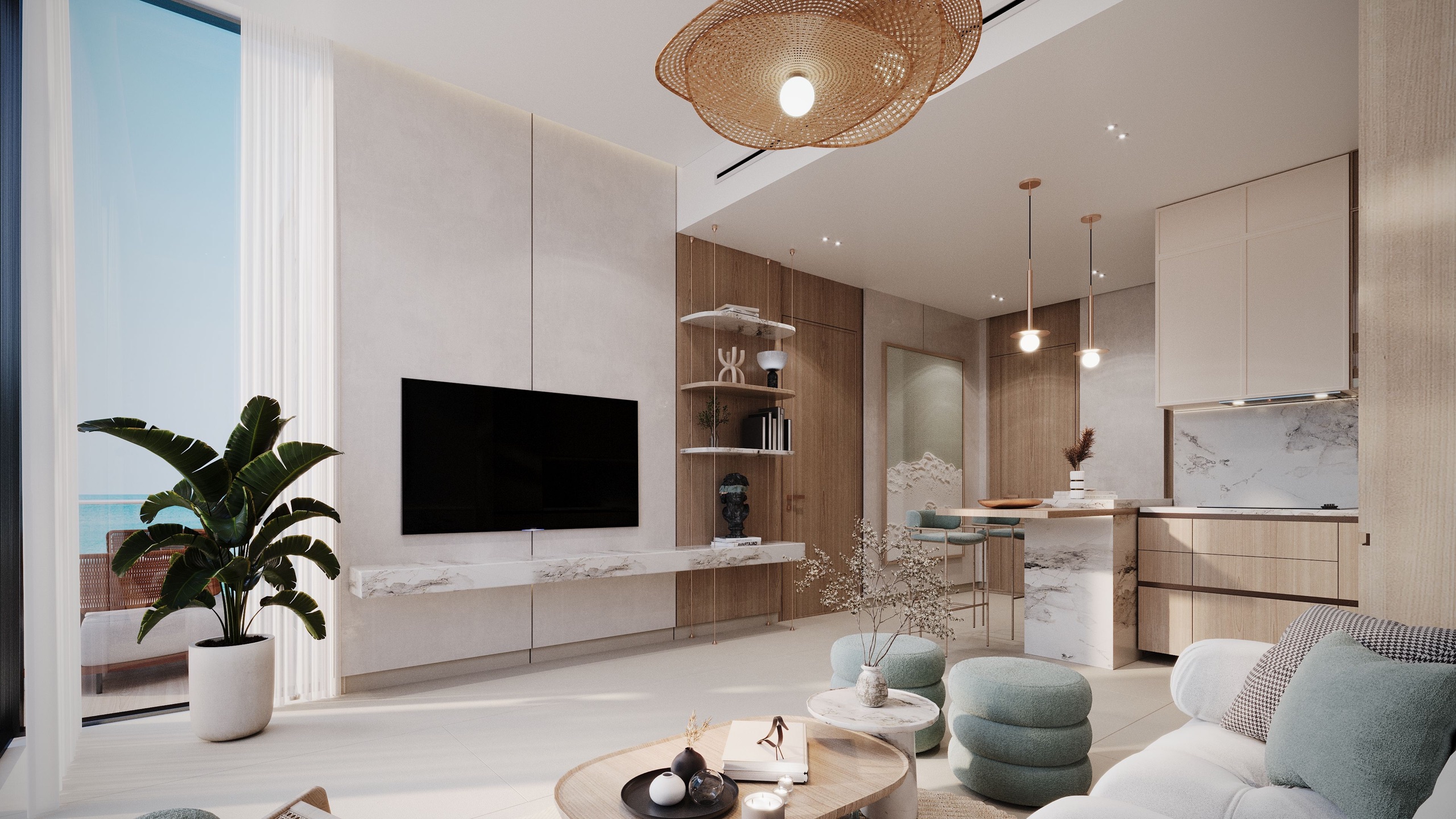 Living room and open kitchen in a One RAK Central apartment