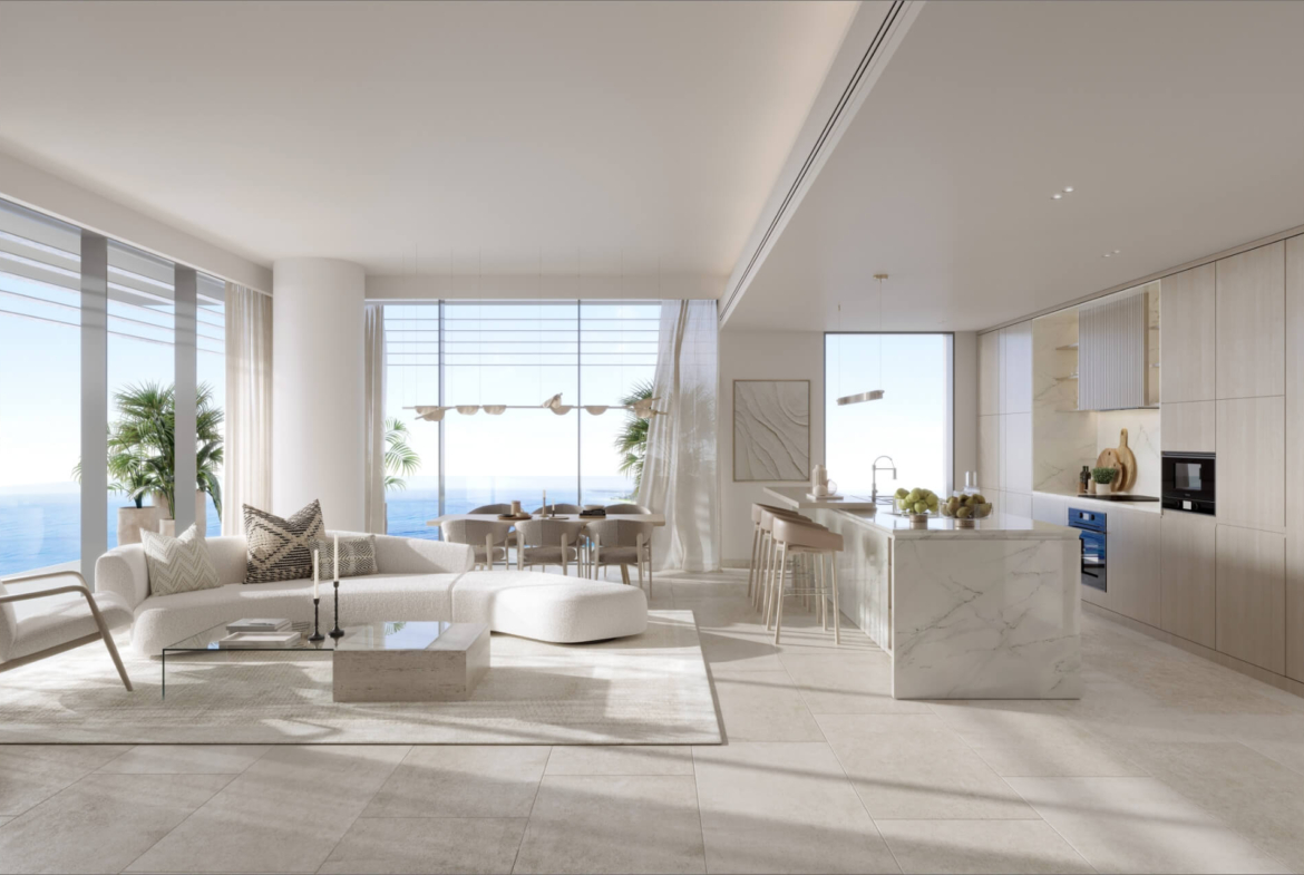 Open-plan living room and kitchen with sea views at Playa Del Sol