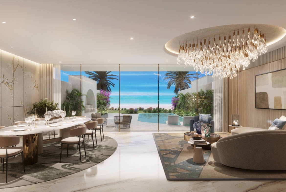 Beach villa living and dining area with private pool at Sora Beach Residences