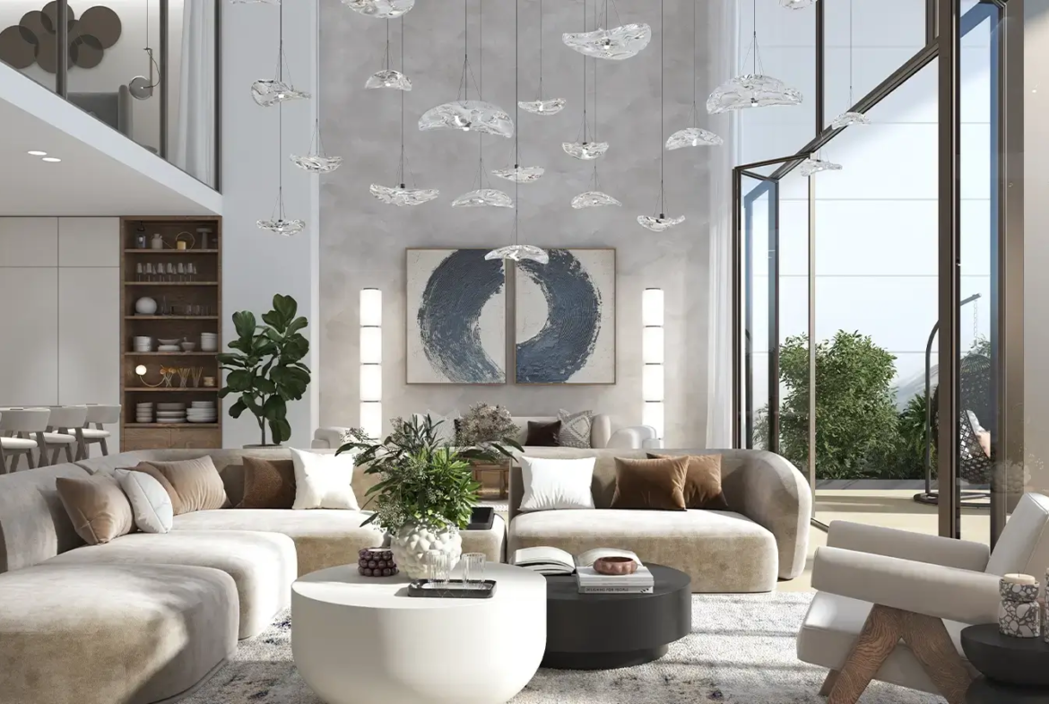 Double-height living room at Beach House at Bay Residences in Mina Al Arab