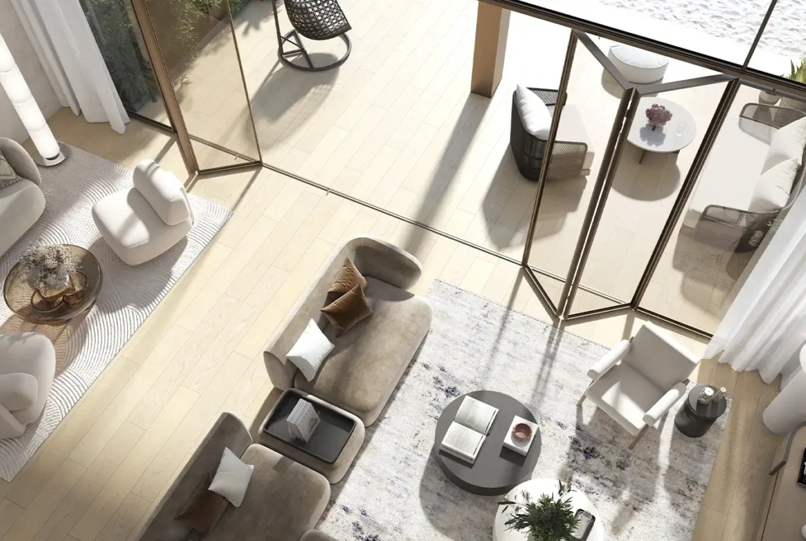 Living room viewed from the mezzanine at Beach House at Bay Residences