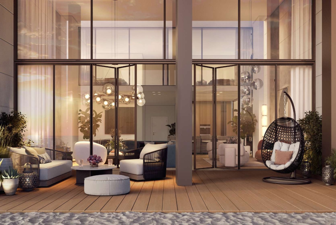 Private terrace and double-height glazing at Beach House at Bay Residences