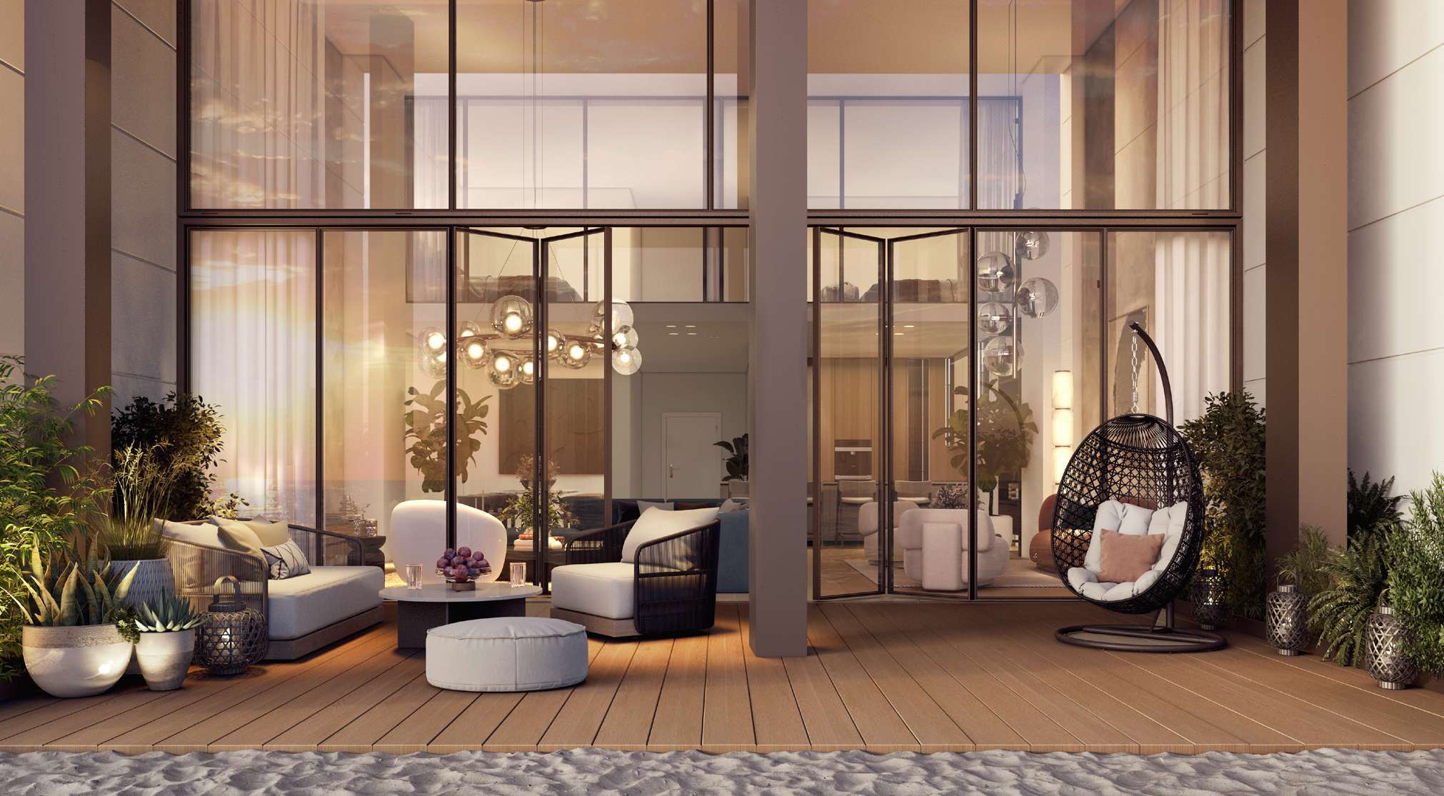 Private terrace and double-height glazing at Beach House at Bay Residences