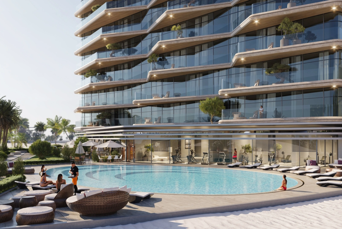 Swimming pool and beachfront setting at The Beach Vista